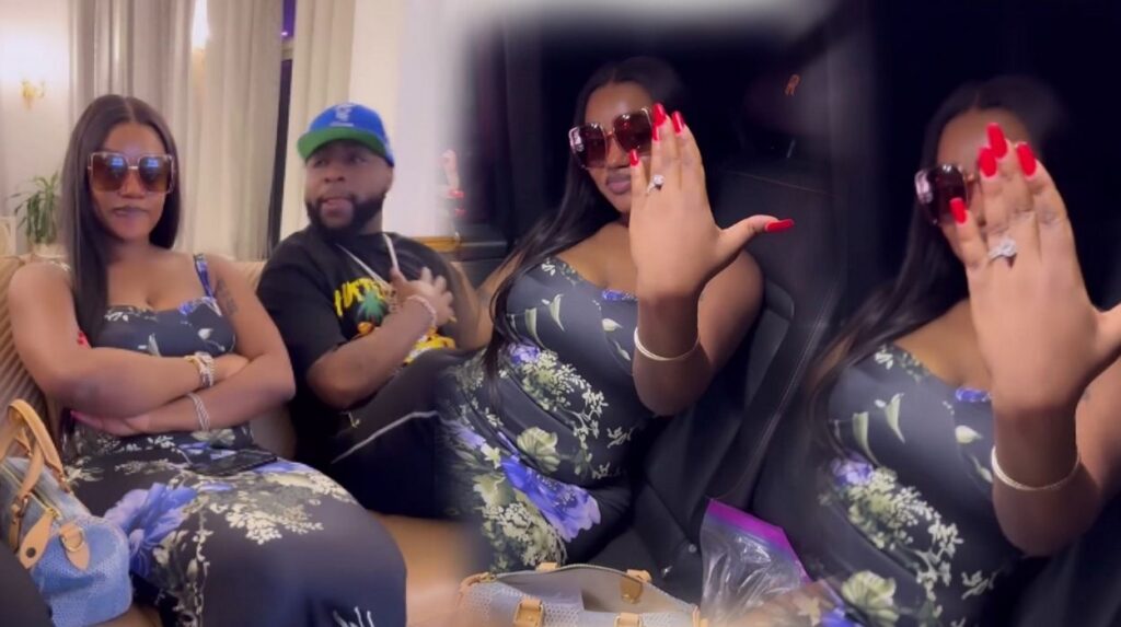 Davido and Chioma sit together on a couch. Chioma displays her engagement ring.