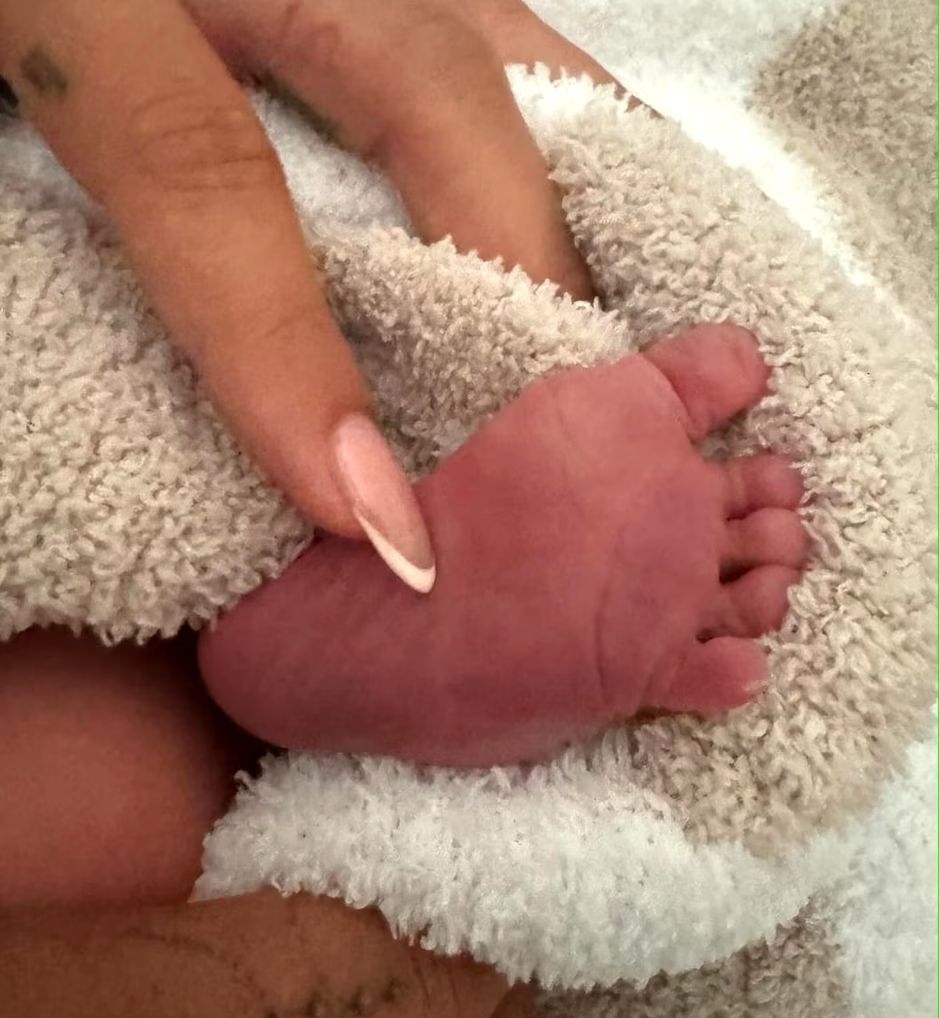 Hailey Bieber caressing the leg of her and Justin Bieber's new born Jack Blues Bieber