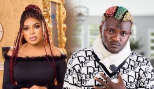 Bobrisky on the left showcases a bold fashion choice with braided hair and fur-accented attire, while the Portable on the right displays vibrant hair colours and holds a microphone, hinting at his profession in music.