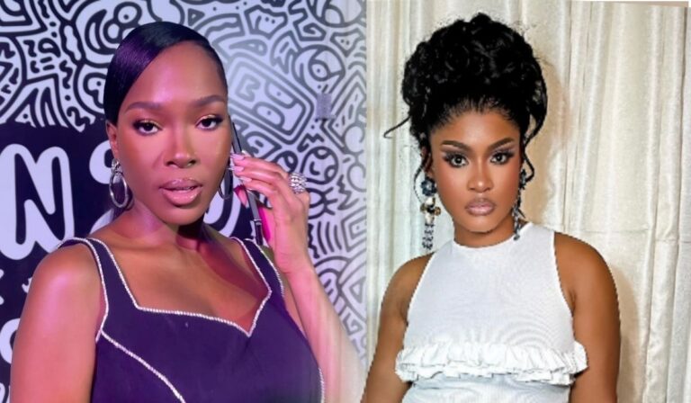 BBNaija stars Vee (left) and Phyna (right), both posing in stylish outfits. Vee sports a sleek look with a dark dress and minimal makeup, while Phyna wears a white outfit with bold makeup and an elegant updo.