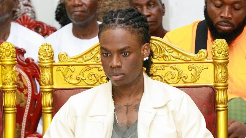 Singer Rema sitting during an event in Edo State