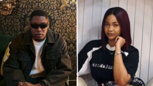 Composite of BBNaija stars Shaun and Victoria. Shaun (left) is wearing a white t-shirt under an oversized dark jacket, while Victoria (right) is dressed in a black t-shirt with bold white lettering.