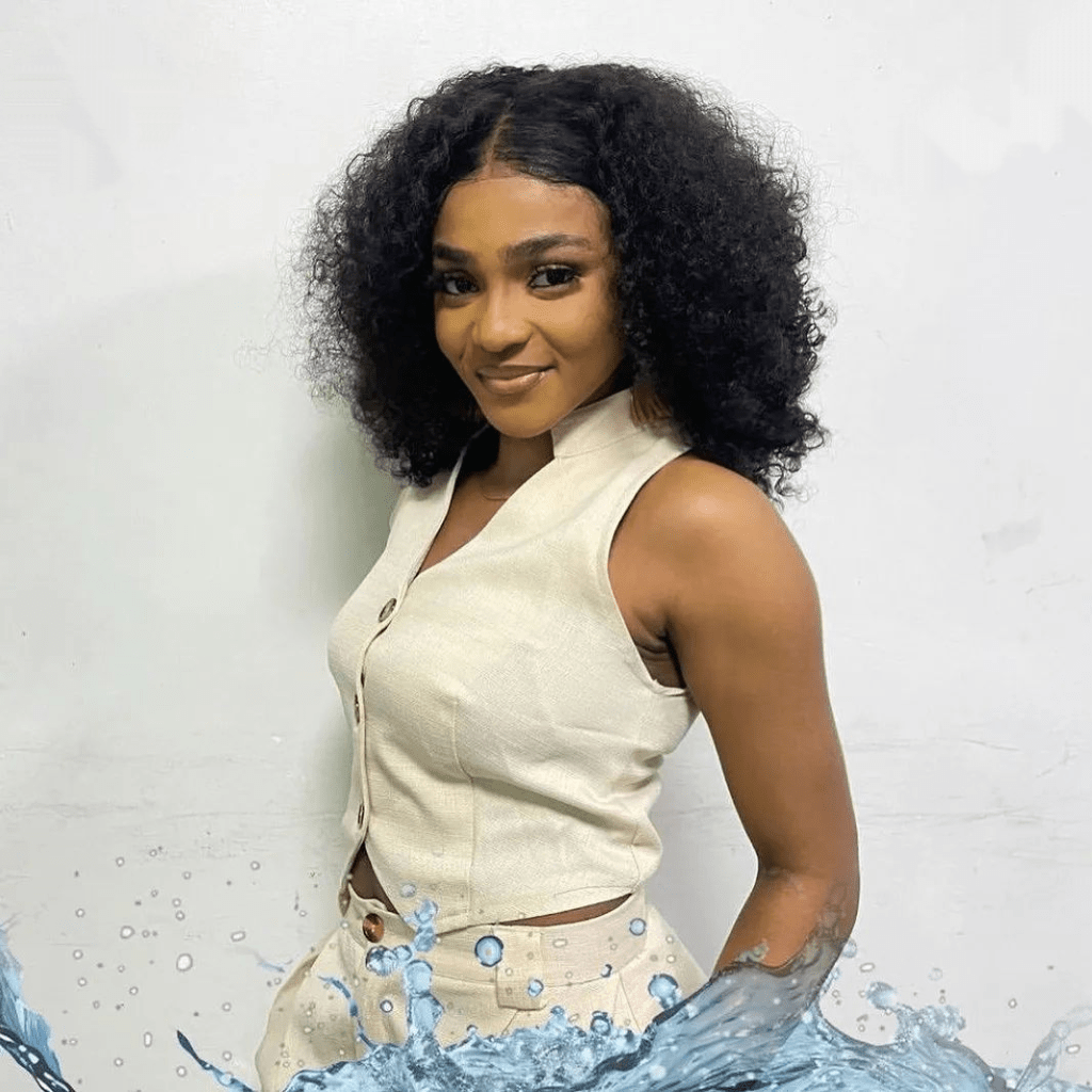 BBNaija star Kassia smiling confidently in a stylish outfit.