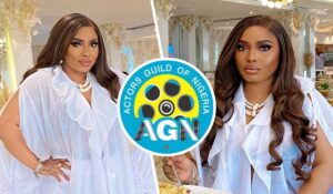 Halima Abubakar poses elegantly in a stylish outfit, showcasing her beauty. The Actors Guild of Nigeria (AGN) logo is prominently featured, symbolizing her connection to the Nigerian film industry.