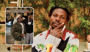 Asake poses thoughtfully, alongside a playful screenshot of a clip hinting at a humorous incident involving an iPhone 16 pro max.