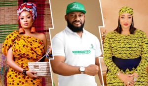 A collage featuring actor Yul Edochie in the middle wearing a white polo shirt with a "Winbiglotto" logo and green cap, flanked by his first wife May on the left in a vibrant yellow and black patterned dress with a matching headwrap and clutch, and his second wife Judy on the right in a yellow dress with black leaf patterns and a coordinating headscarf.