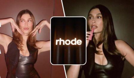 A collage featuring Hailey Bieber in a black leather outfit, posing with her hands near her face on the left and holding a pink object near her mouth on the right, with the "rhode" brand name prominently displayed in the center against a dark, curtained background.