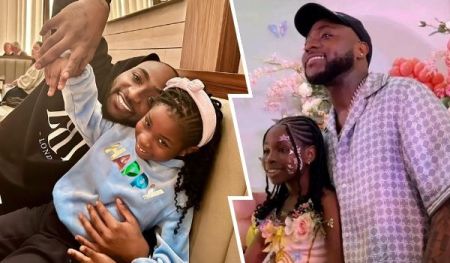 A collage featuring singer Davido with his daughter Imade in two distinct settings. On the left, Davido is seen sitting on a couch, wearing a black hoodie, and playfully holding hands with Imade, who is dressed in a light blue hoodie with the word "HAPPY" and a pink headband, both smiling warmly. On the right, Davido stands wearing a patterned shirt and a black cap, posing with Imade, who has face paint and a floral accessory, set against a colorful backdrop with flowers and butterflies.