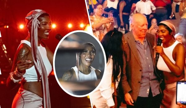 Singer Tiwa Savage is featured in a collage, performing energetically on stage in a white crop top and pink skirt with a headscarf under red lighting, and also seen smiling with a microphone alongside an older man in a brown suit, surrounded by an enthusiastic crowd taking photos.