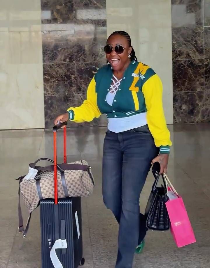 The image shows Blessing CEO arriving Asaba prior to her wedding. Provide a concise alternative text of the image for a blog without mentioning 'image’ in the text.