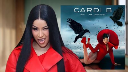 Cardi B stands confidently in a red outfit with sleek black hair, while beside her, the “Am I The Drama?” album cover features her in a dramatic red pose with a raven perched on her heel, set against a moody sky filled with black birds.