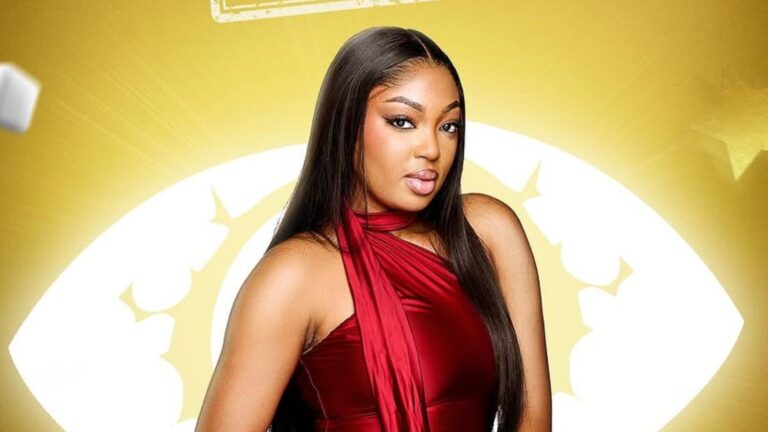 BBNaija Season 10 housemate Mide posing in a red outfit against the iconic Big Brother Naija eye logo backdrop.