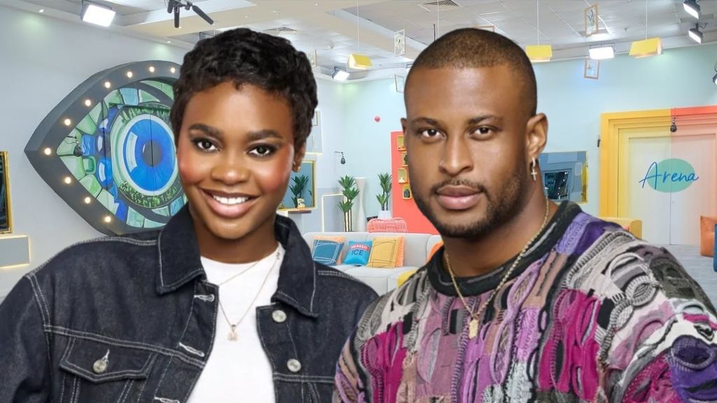 BBNaija Season 10 housemates Dede and Kaybobo smiling together inside the Big Brother Naija house, with the iconic eye logo and vibrant lounge area in the background.