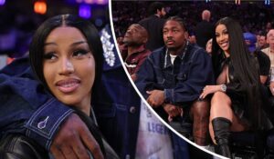 Cardi B, dressed in a black leather outfit and thigh-high boots, sits beside Stefon Diggs, who sports a denim jacket and visible hand tattoos, at a lively sports arena surrounded by spectators.
