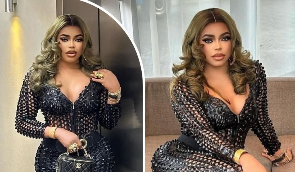 Two stylish poses of crossdresser Bobrisky in a black, intricately designed dress with cut-out patterns, accessorized with gold jewelry and a Chanel handbag, set against a modern indoor background.