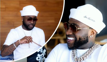 A collage showcasing singer Davido wearing a white outfit and cap, accessorized with sunglasses, a chunky gold chain, and bracelets, set against a wooden background.