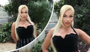 Tacha poses outdoors in a fitted black top and long blonde hair, showcasing her bold fashion style amid greenery.