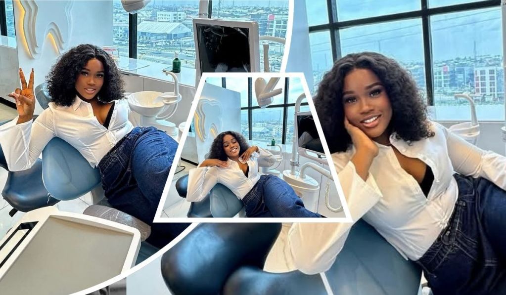 Cee C poses confidently at Whiten Lighten dental clinic during her check-up. She is dressed in a white blouse and jeans, smiling brightly while seated on a dental chair.