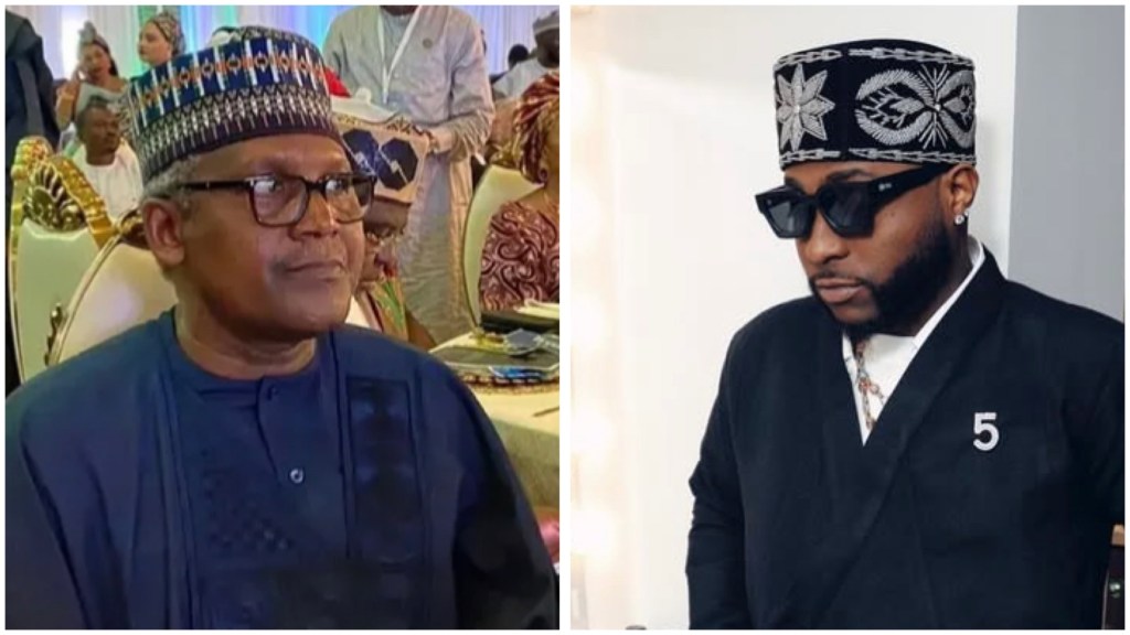 Aliko Dangote in a navy agbada and patterned cap seated at a banquet table while Davido is in a black outfit with an embroidered cap and dark sunglasses, facing left against a light wall