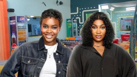 BBNaija Season 10 housemates Dede and Sultana smiling together inside the colourful Big Brother Naija house lounge.