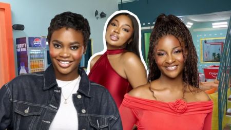 BBNaija Season 10 housemates Dede, Mide, and Big Soso smile for the camera inside the Big Brother Naija house, dressed in stylish outfits with a colourful lounge setting in the background.