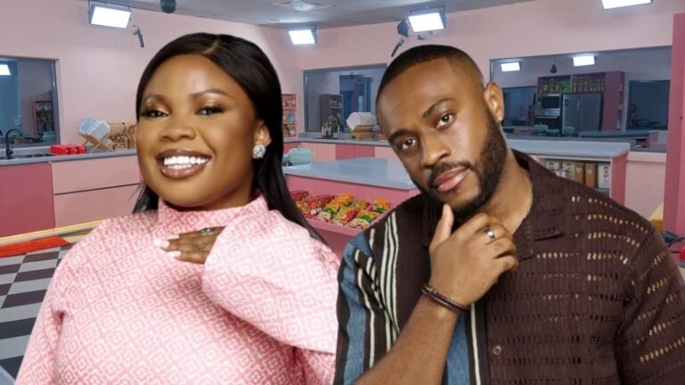 BBNaija Season 10 housemates Doris and Lola posing together in the Big Brother Naija house kitchen area. Doris smiles brightly in a patterned pink outfit, while Lola stands beside her with a thoughtful pose in a striped brown shirt.