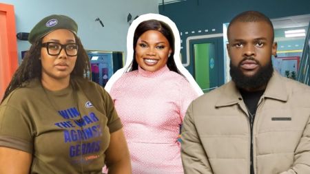 BBNaija Season 10 housemates Gigi Jasmine, Doris, and Denari pose together inside the Big Brother Naija house; Gigi wears a Carex beret and t-shirt, Doris smiles in a pink patterned dress, while Denari stands in a beige jacket.