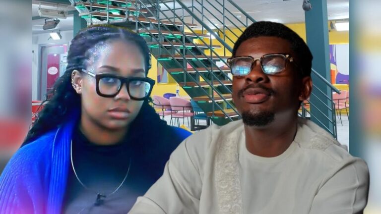 BBNaija Season 10 housemates Gigi Jasmine and Victory pictured in the Big Brother house, with Gigi Jasmine in a blue sweater and glasses, and Victory in a white traditional outfit and glasses.