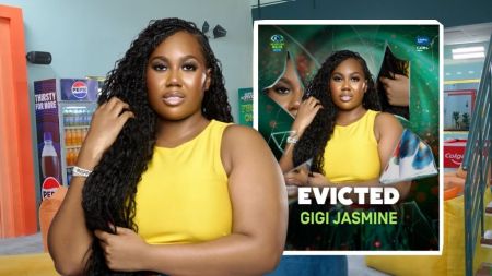 BBNaija Season 10 housemate Gigi Jasmine is pictured in a sleeveless yellow dress with long wavy hair, standing inside the Big Brother Naija house. An inset graphic shows her official eviction card with the word “Evicted” boldly written above her name.