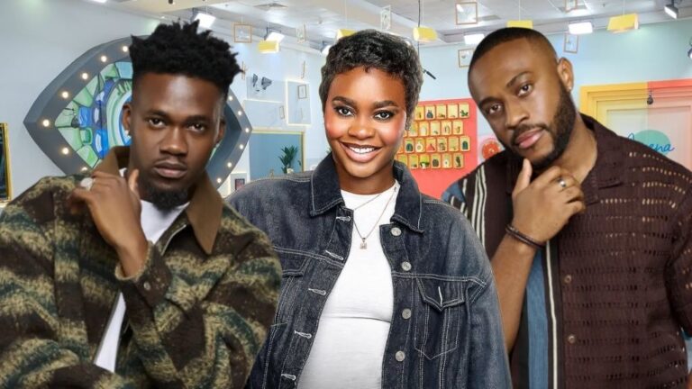 BBNaija Season 10 housemates Jason Jae in a patterned jacket, Dede in a denim jacket, and Kola in a brown striped shirt posing inside the Big Brother house.