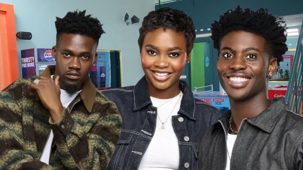 BBNaija Season 10 housemates Jason Jae, Dede, and Koyin posing inside the Big Brother Naija house, with Jason Jae in a patterned green and brown jacket, Dede in a dark denim jacket over a white top, and Koyin in a dark denim jacket, all smiling towards the camera except Jason Jae who has a serious expression.