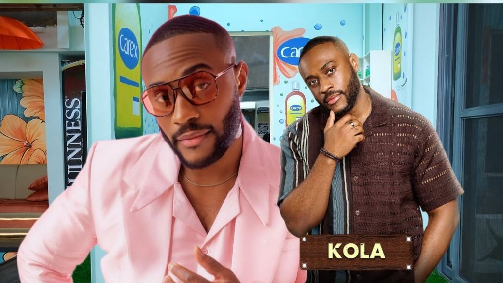 BBNaija housemate Kola poses stylishly in two different outfits — a pink suit with tinted glasses and a brown short-sleeve shirt — inside the Big Brother Naija house.