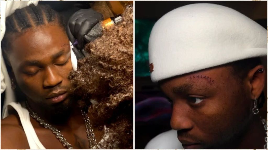 Nigerian singer Omah Lay gets a new tattoo on his face, showing the word “REMEMBER” inked above his right eyebrow, as seen during and after the tattoo session.