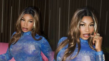 Big Brother Naija star Tacha Akide stuns in a bold sheer blue patterned outfit, flaunting her glam makeup and styled long hair while striking confident poses.