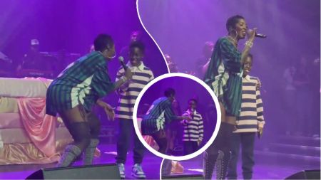 Nigerian singer Tiwa Savage performs on stage in London while her son, Jamil, joins her for a surprise moment. The mother and son are seen smiling and sharing the microphone during the live concert.