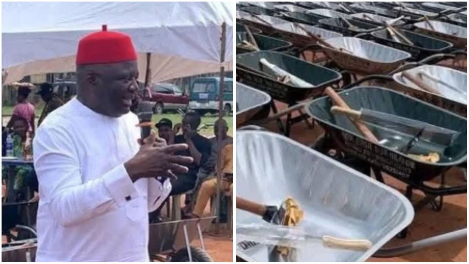Anambra lawmaker Dominic Okafor speaking at an event distributing branded wheelbarrows and cutlasses to community members, with recipients seated under tents in the background.