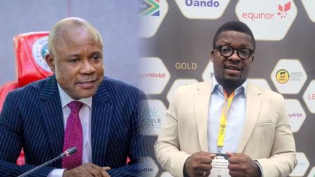 Enugu State governor Barr. Peter Mbah seated in an official setting, alongside Sujimoto boss Olasijibomi Ogundele at an event with brand banners in the background.