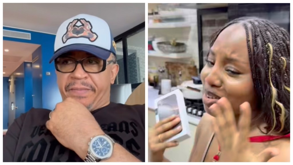 Daddy Freeze gives daughter Isabella a gift box in kitchen