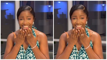 Nigerian chef Hilda Baci smiles brightly while covering her mouth with her hands, dressed in a patterned green outfit.