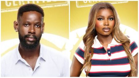 BBNaija housemates Isabella and Mensan pose in their official portraits against a yellow background