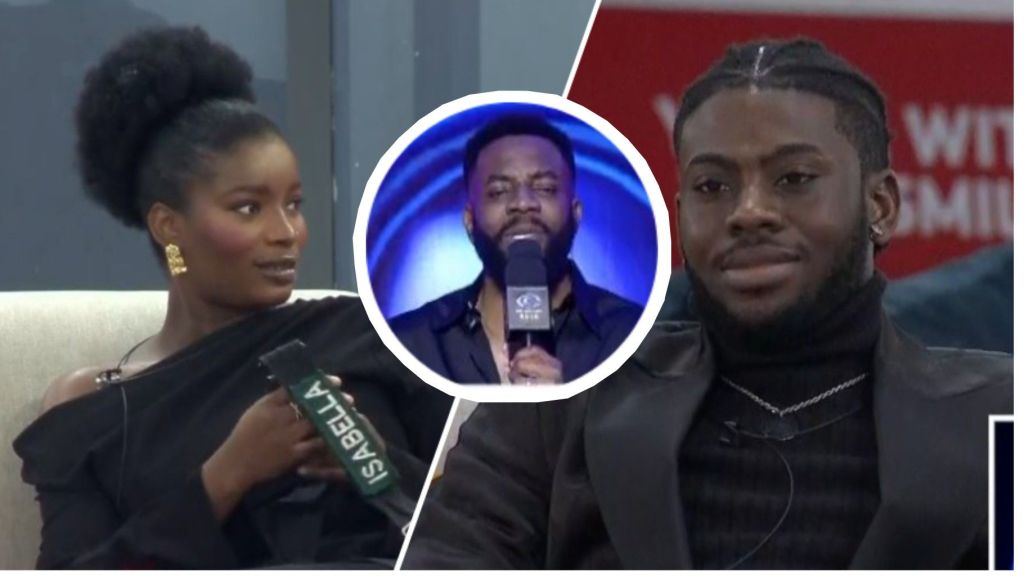 BBNaija Season 10 housemates Isabella and Koyin seated indoors during a live eviction show, with an inset of host Ebuka Obi-Uchendu speaking into a microphone.