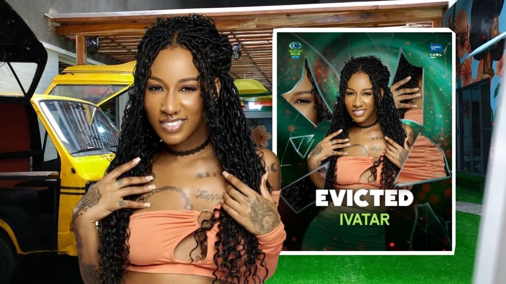 BBNaija Season 10 housemate Ivatar poses in an orange crop top, smiling with her hands raised near her chest. Beside her is an eviction poster showing the words “Evicted Ivatar,” confirming her exit from the show.
