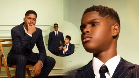 Nigerian actress Angela Okorie and her son Chamberlain Orizu pose in coordinated pinstripe suits for a stylish photoshoot. Angela is seen seated while Chamberlain stands tall beside her, both exuding elegance and confidence.
