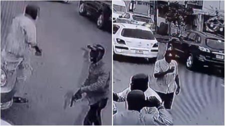 CCTV footage showing police arresting an ex-convict on a busy street. The suspect, wearing a cap and casual shirt, is seen being confronted and restrained by officers while other vehicles and bystanders appear in the background.