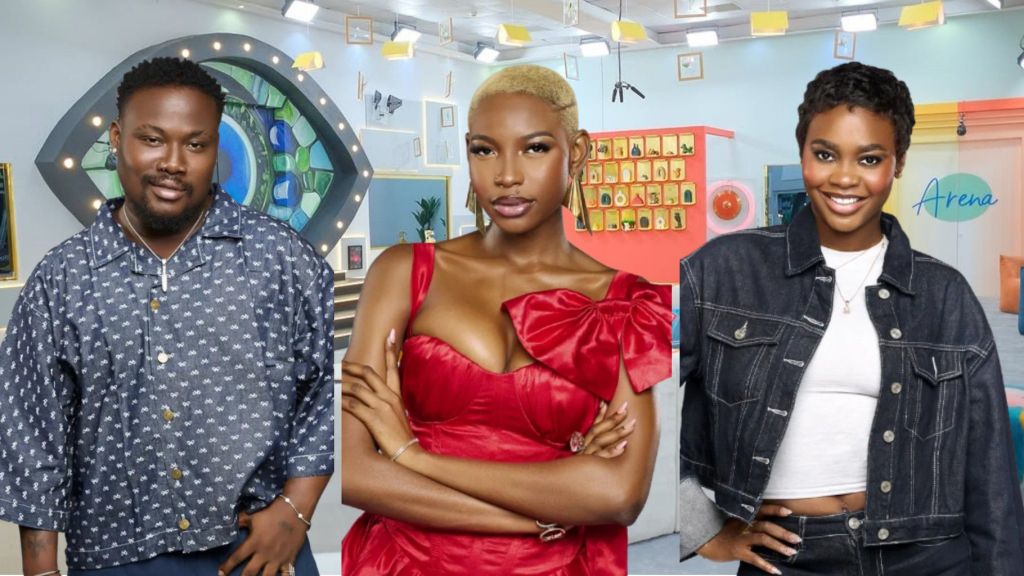 BBNaija Season 10 housemates Rooboy, Dede, and Joanna pose inside the Big Brother Naija house, dressed stylishly and smiling for the camera.