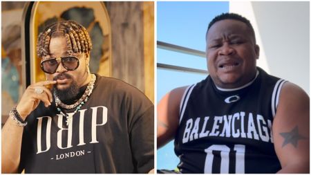 Nigerian singer Whitemoney wearing a black “DRIP London” t-shirt accessorised with sunglasses and chains, alongside nightlife promoter Cubana Chief Priest in a sleeveless black “Balenciaga” shirt with a star tattoo on his arm.