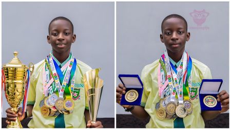 A 15-year-old Nigerian student, Agbo Adoga, proudly displays numerous academic medals and trophies in two side-by-side portraits. In both photos, he wears his Graceland International School uniform with multiple Olympiad medals around his neck, holding golden trophies and plaques that signify his achievements in mathematics and science competitions.