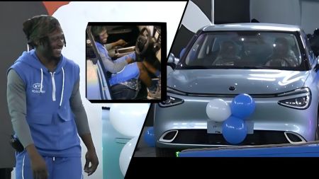 BBNaija housemate Faith smiling as he stands beside his newly won Innoson car, decorated with blue and white balloons, inside Biggie’s house.