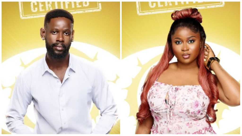 Side-by-side portraits of BBNaija housemates Mensan and Imisi against the official golden certified background. Mensan wears a white shirt, while Imisi poses in a pink floral dress with styled red hair.