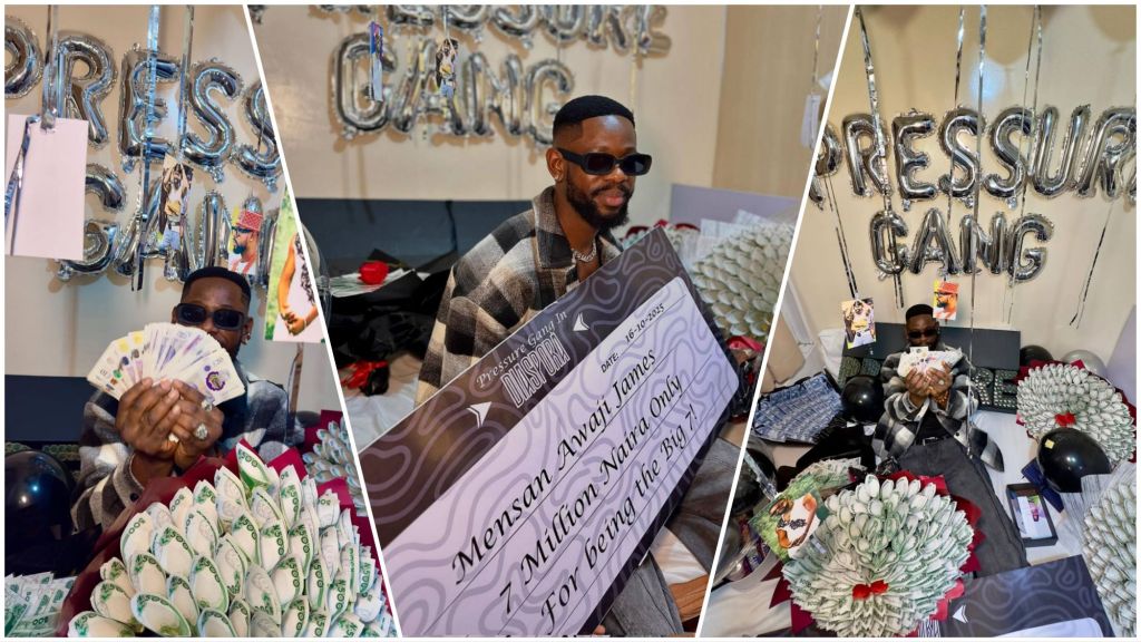 BBNaija housemate Mensan Awaji James poses with pound notes and cash bouquets in a room decorated with silver “PRESSURE GANG” balloons, showcasing a giant cheque of ₦7 million from his diaspora fanbase.